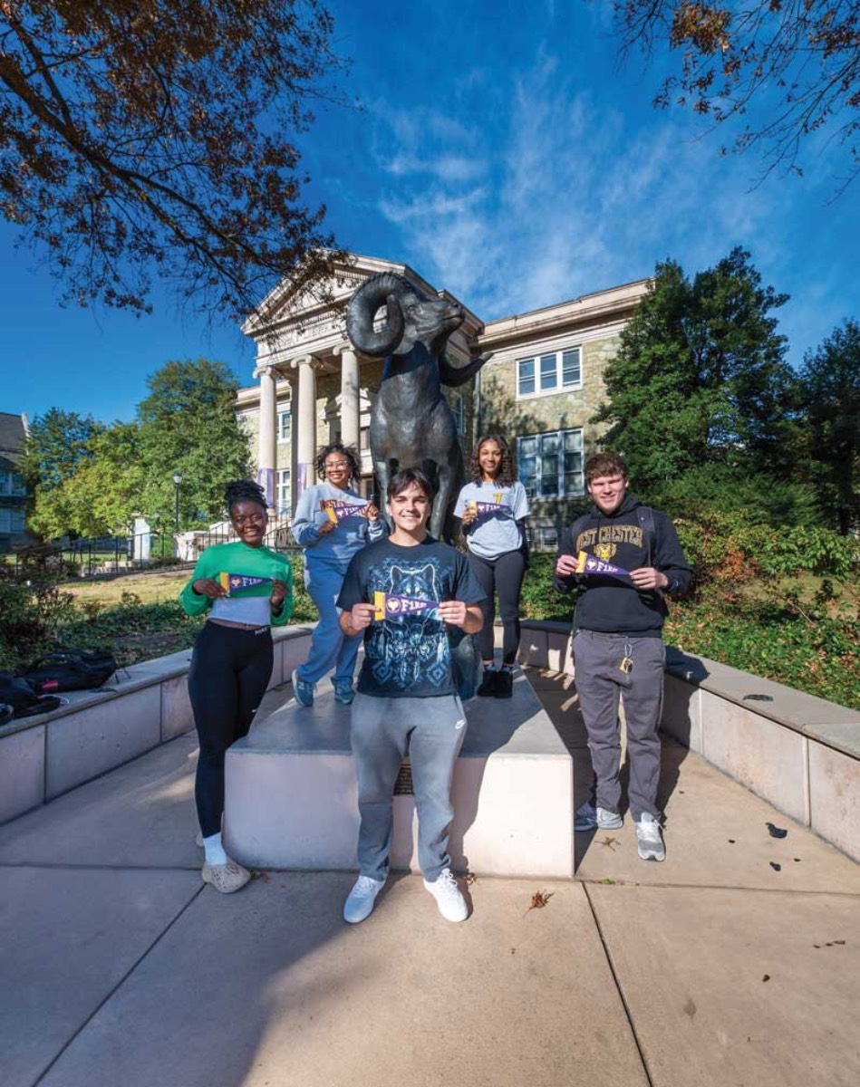 Magazine Cover - WC F1RST students standing in front of the Ram Statue