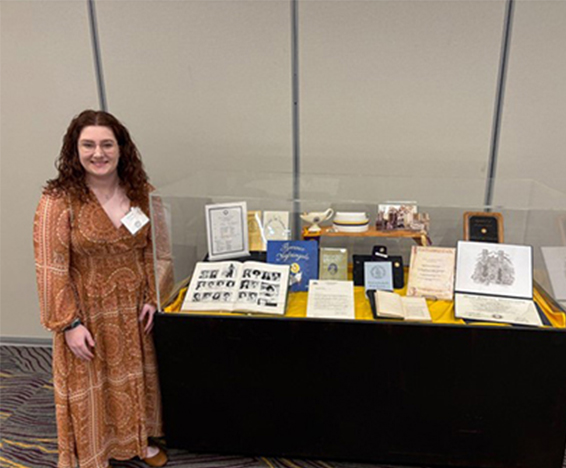 Student infront of the exhibit