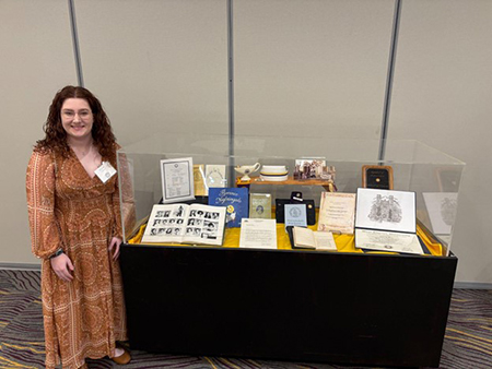 Student infront of table