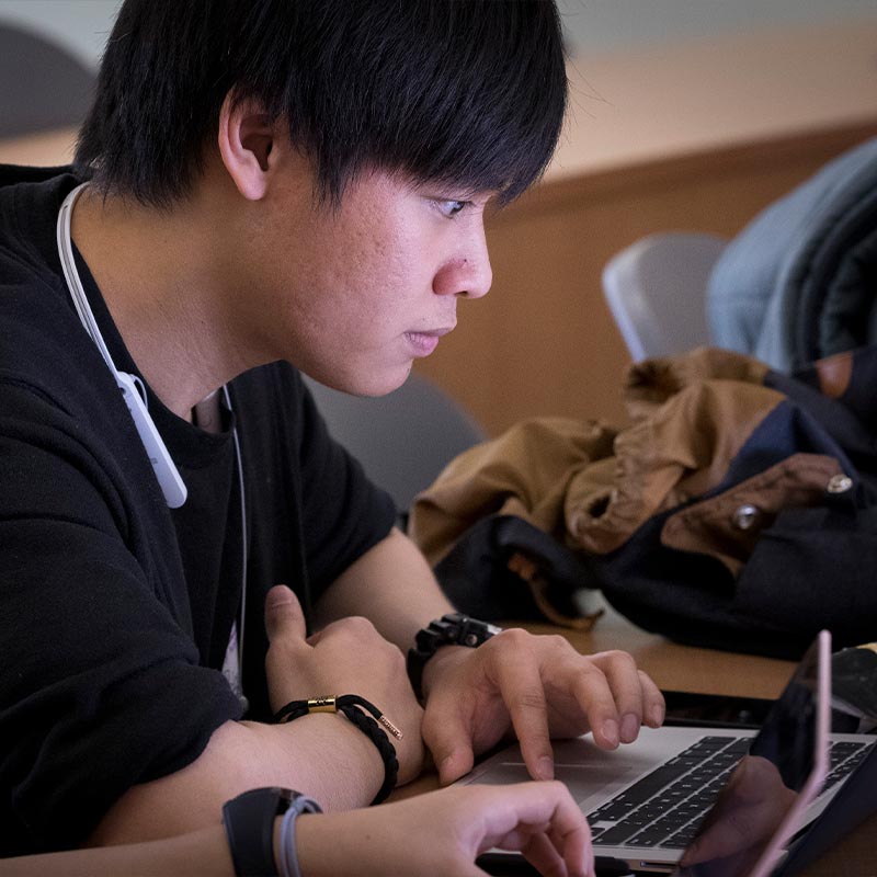 Student working on Laptops