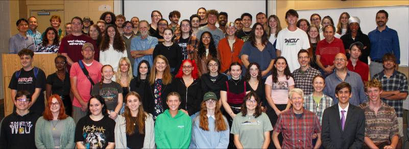 A group photo of the ESS students, staff, and faculty for the 2024-2025 academic year. 