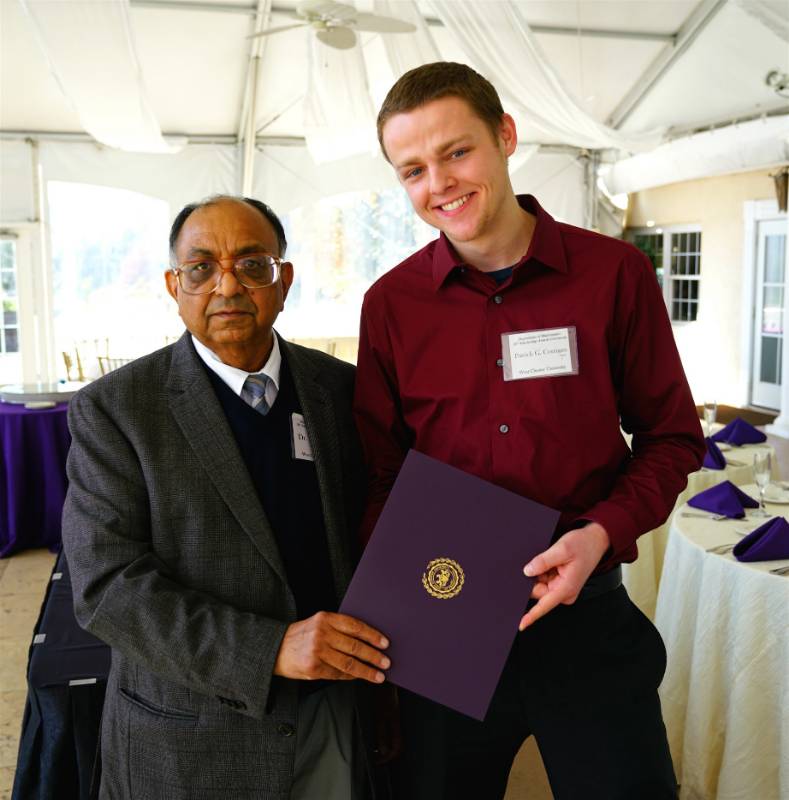 Dr. Shiv Gupta and Patrick G. Corrigan, recipient of the Frank E. Milliman Scholarship