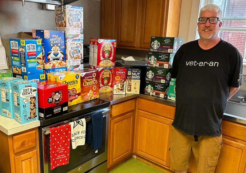 Jeremy Ruspantine (Secretary- pictured with pantry items)